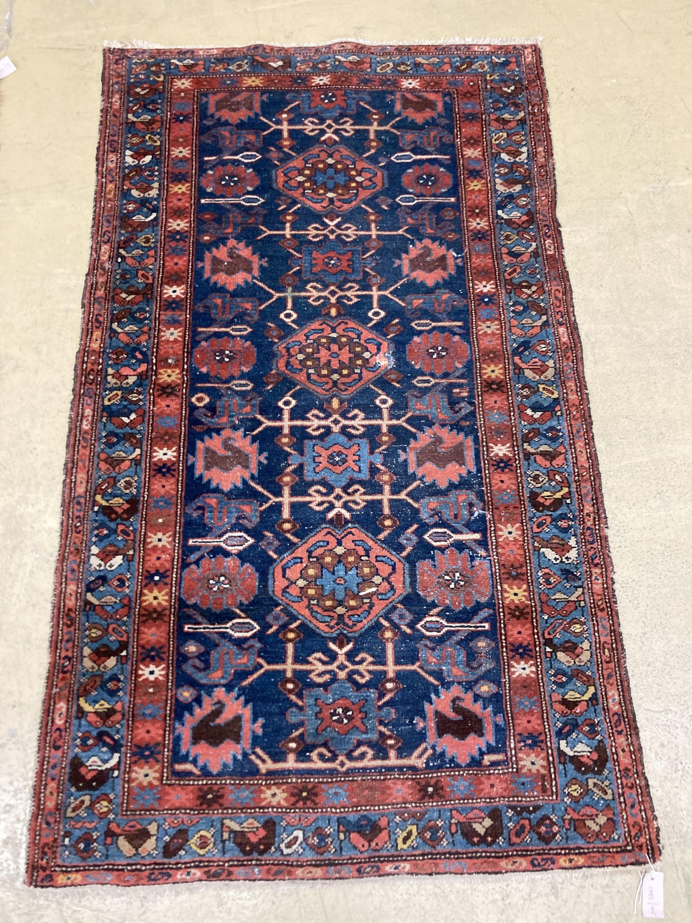 An antique Hamadan blue ground rug, 180 x 104cm